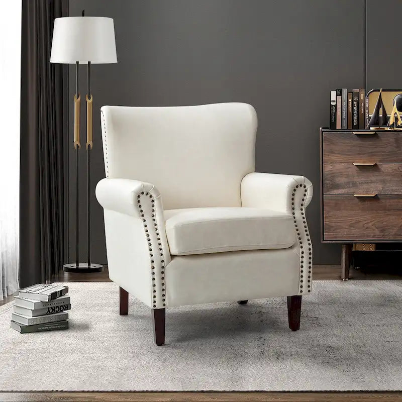 Fauteuil de transition en similicuir végétalien avec accoudoirs roulés et garniture cloutée
