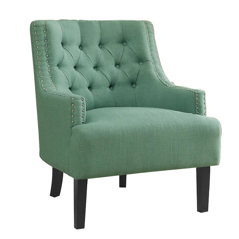 Poltrona d'accento in ciniglia color verde petrolio con schienale trapuntato a bottoni e bordino con borchie