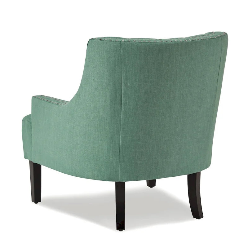 Poltrona d'accento in ciniglia color verde petrolio con schienale trapuntato a bottoni e bordino con borchie